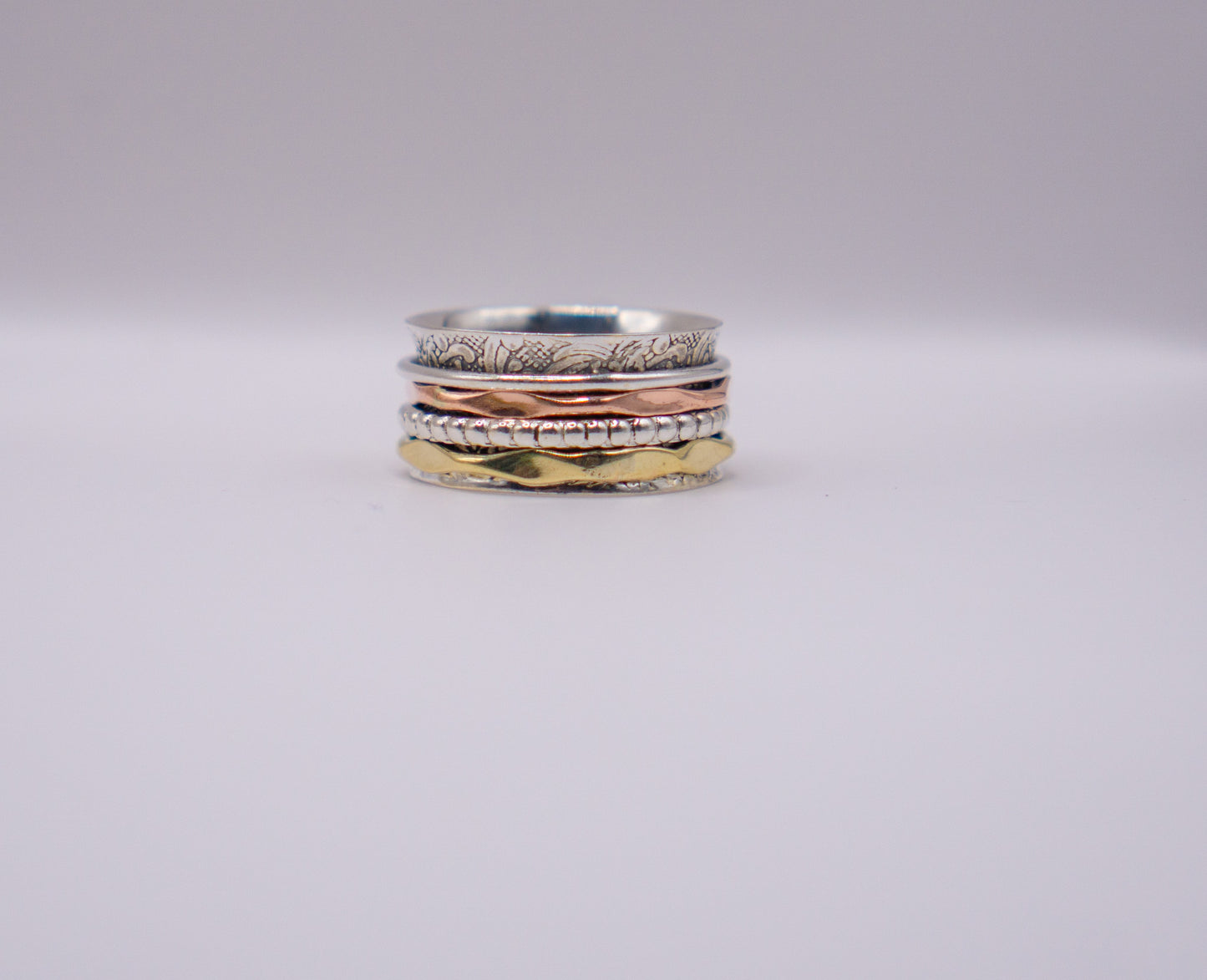 Elegant 4-Band Mixed Metal Spinner Ring