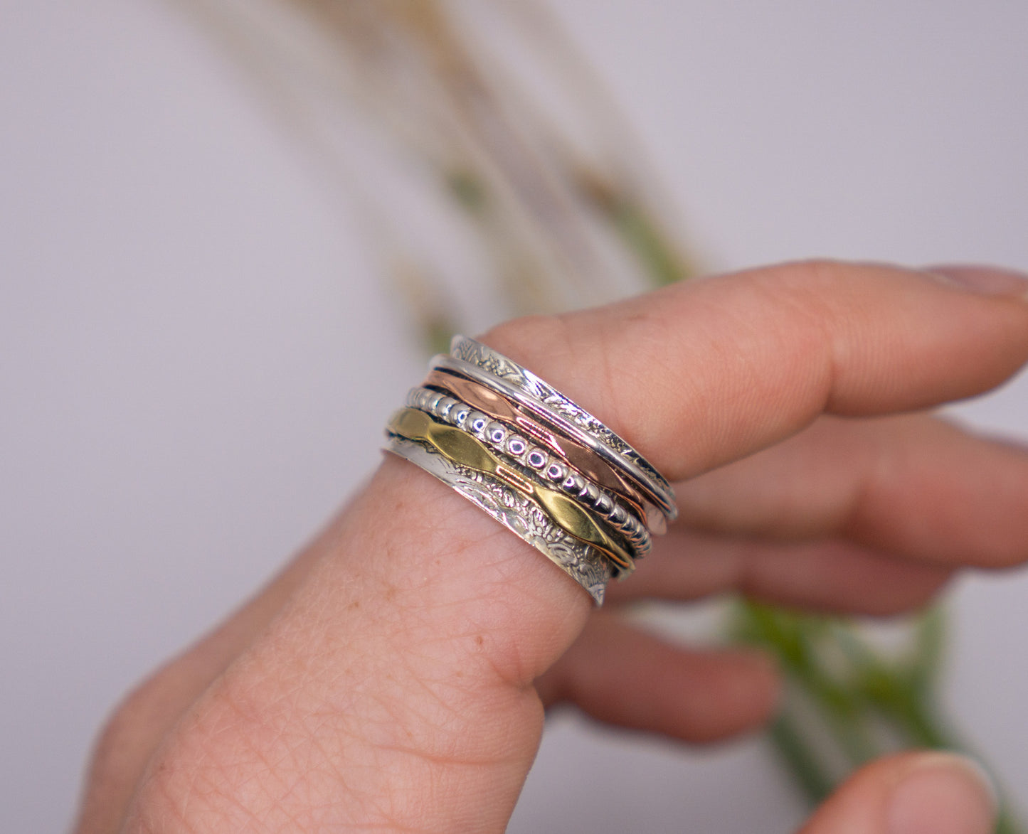 Elegant 4-Band Mixed Metal Spinner Ring