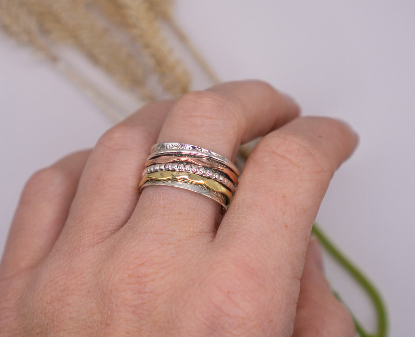 Elegant 4-Band Mixed Metal Spinner Ring