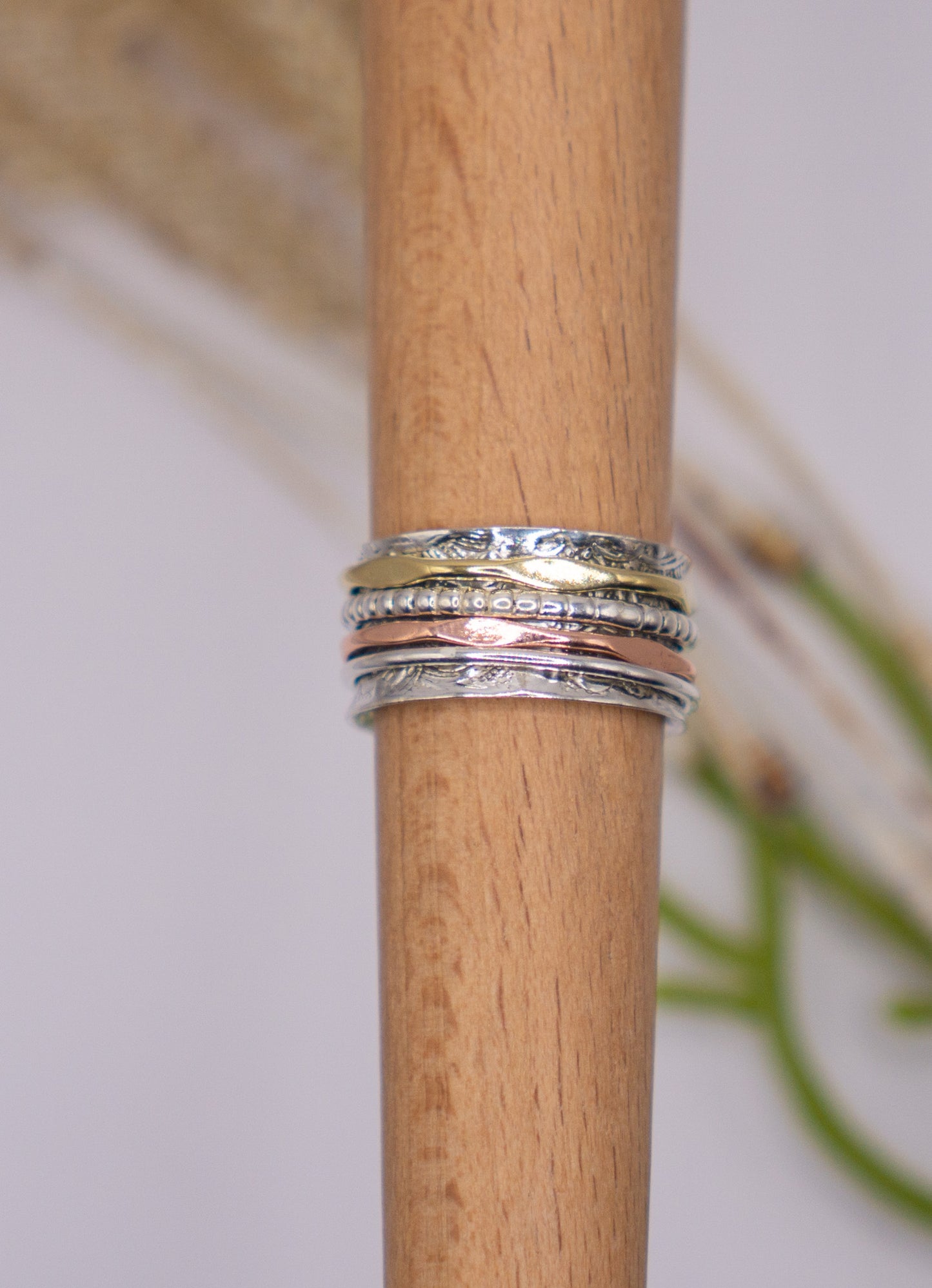 Elegant 4-Band Mixed Metal Spinner Ring