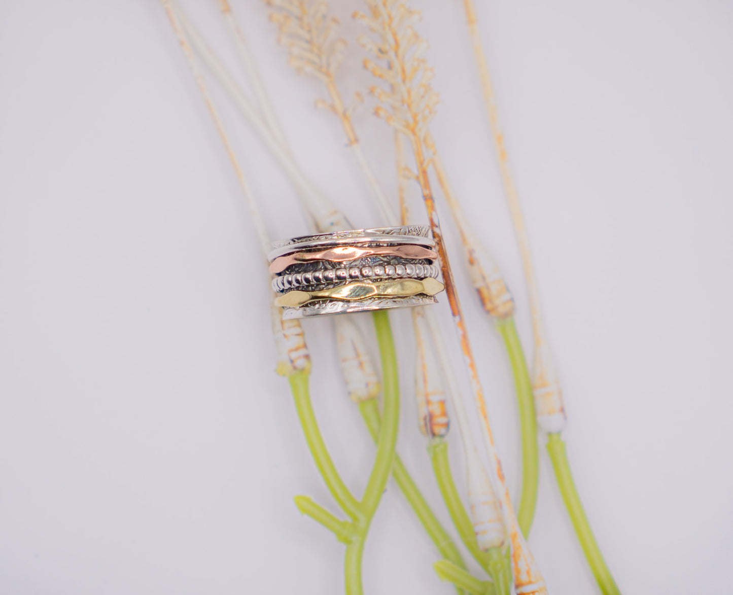 Elegant 4-Band Mixed Metal Spinner Ring